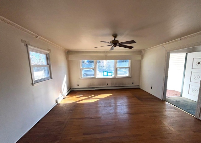 spare room featuring hardwood / wood-style flooring, a baseboard radiator, crown molding, and ceiling fan