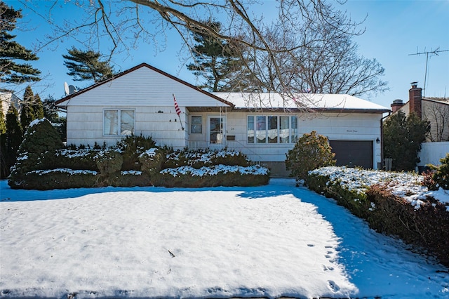 single story home with a garage