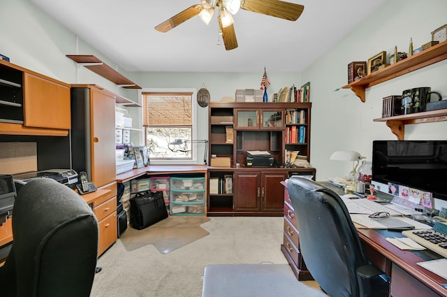 home office with light colored carpet and ceiling fan