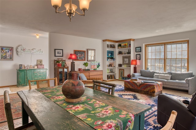 dining space featuring an inviting chandelier