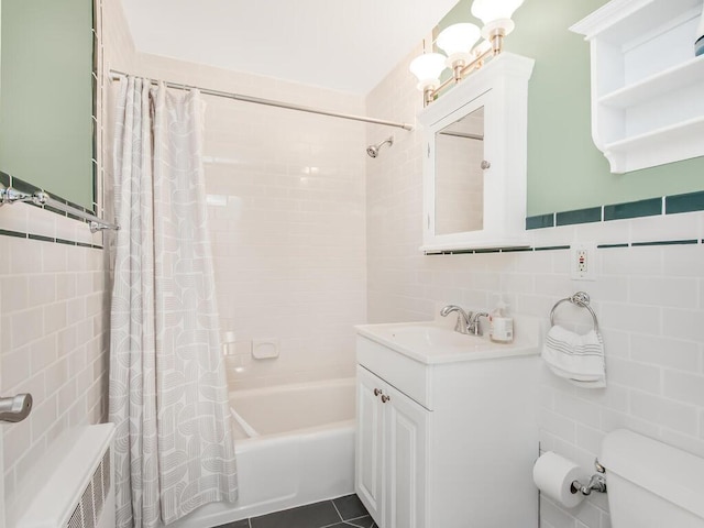 full bathroom with tile patterned floors, toilet, tile walls, shower / bathtub combination with curtain, and radiator