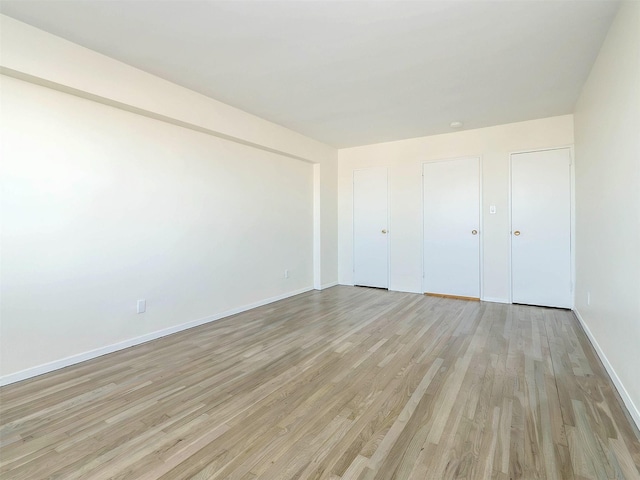 unfurnished bedroom featuring light hardwood / wood-style flooring