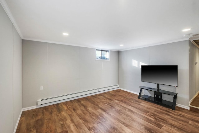 basement featuring wood-type flooring, a baseboard heating unit, and crown molding