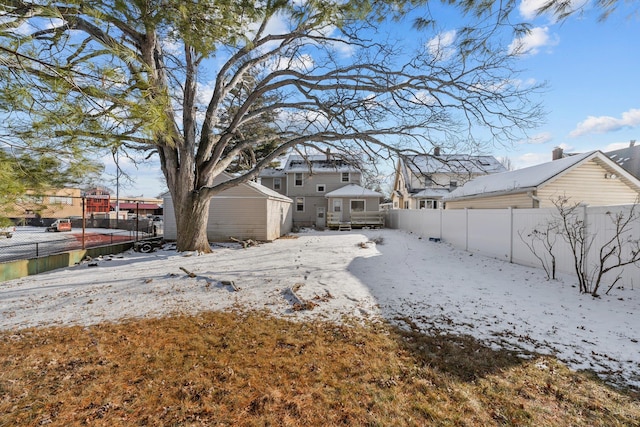 view of yard covered in snow