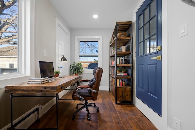 office with dark hardwood / wood-style flooring