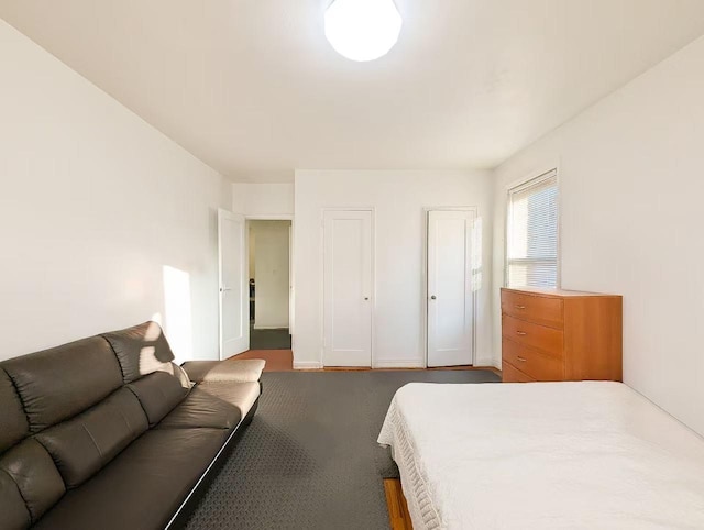 bedroom featuring hardwood / wood-style floors