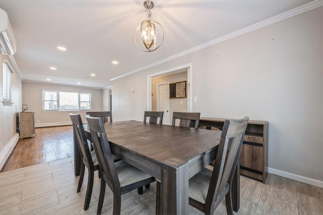 dining area featuring ornamental molding, an AC wall unit, and a notable chandelier