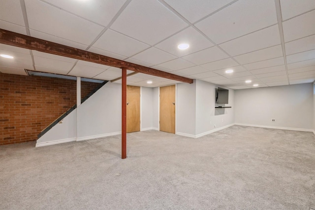 basement featuring carpet flooring