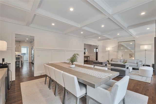 dining space with coffered ceiling, beam ceiling, and dark wood-type flooring