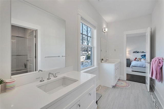 bathroom featuring vanity and wood-type flooring