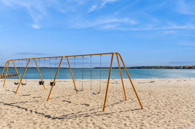 property view of water featuring a beach view