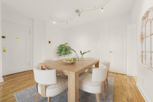 dining room featuring light hardwood / wood-style floors