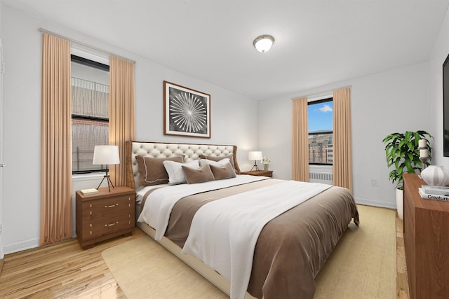 bedroom featuring light wood-type flooring