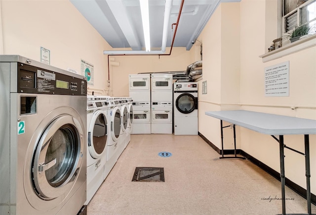 laundry room featuring washing machine and dryer and stacked washing maching and dryer