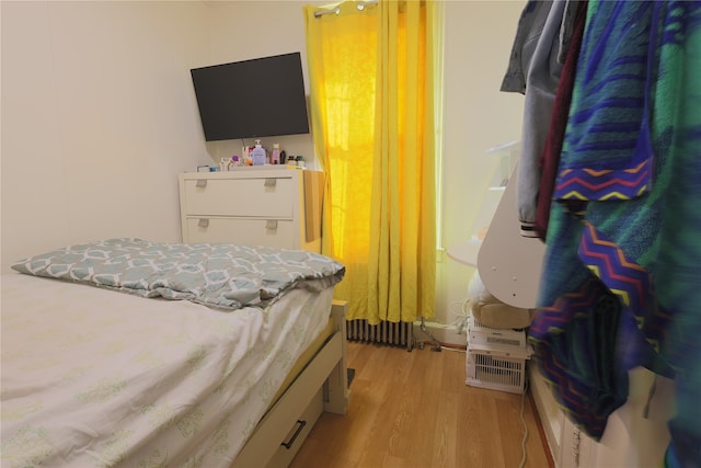 bedroom with light wood-type flooring