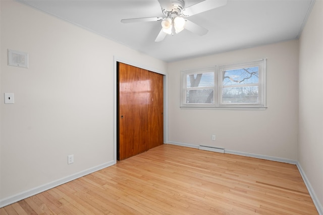 unfurnished bedroom with a closet, ceiling fan, and light hardwood / wood-style flooring