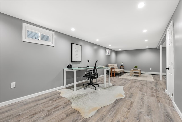 office area with light hardwood / wood-style flooring