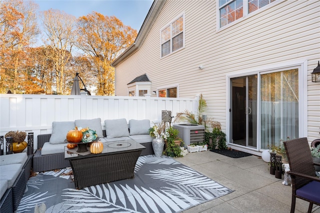 view of patio / terrace with outdoor lounge area and central air condition unit