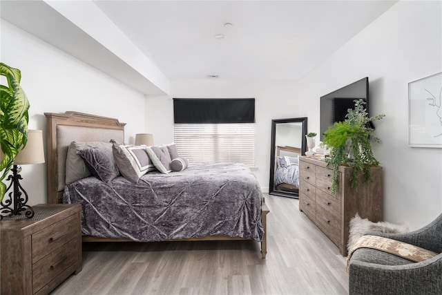 bedroom featuring light hardwood / wood-style floors