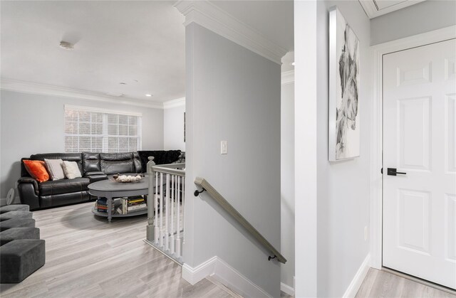 interior space featuring ornamental molding and wood-type flooring