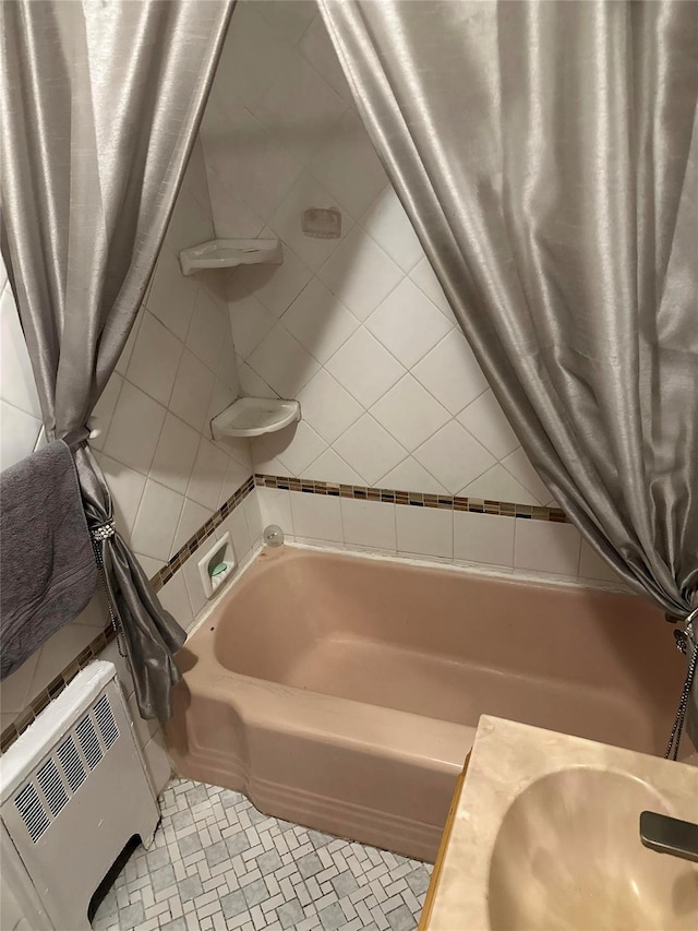 bathroom featuring shower / tub combo with curtain and tile patterned floors