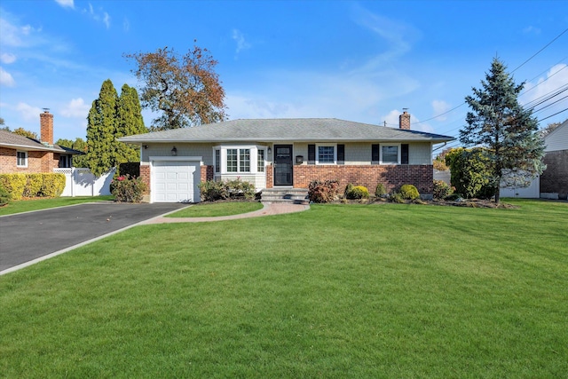 ranch-style house with a garage and a front yard