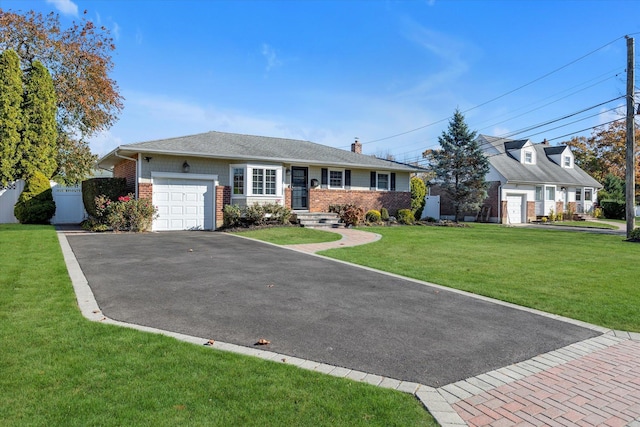 single story home with a garage and a front yard