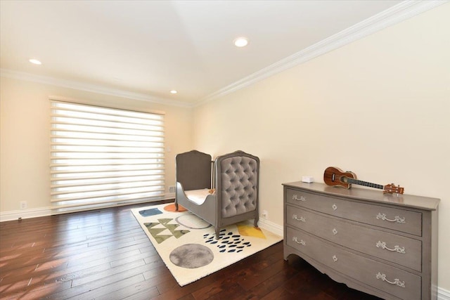 living area with dark wood-type flooring and ornamental molding