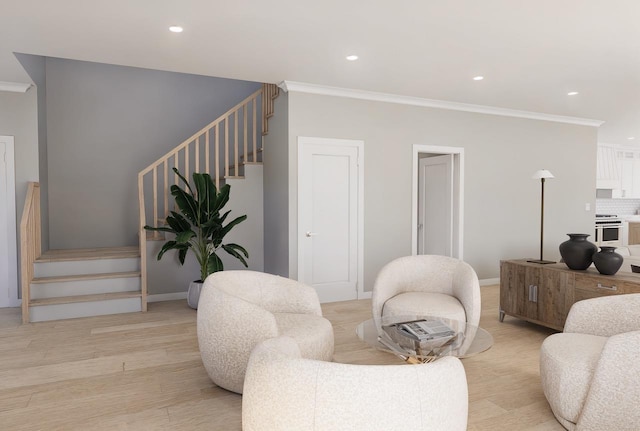 living room with crown molding and light wood-type flooring