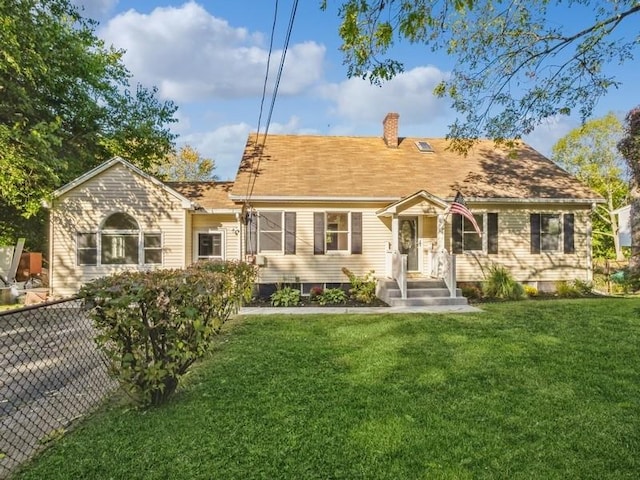 view of front of home with a front yard