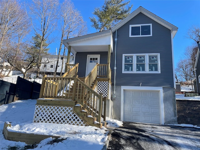 view of front of property featuring a garage