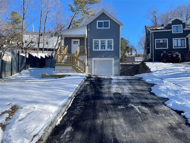 view of front of property featuring a garage