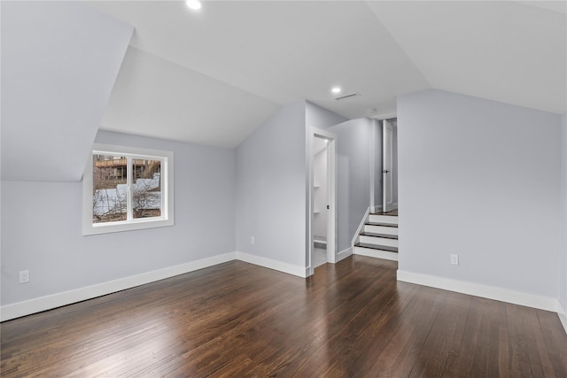 bonus room featuring visible vents, baseboards, and hardwood / wood-style floors