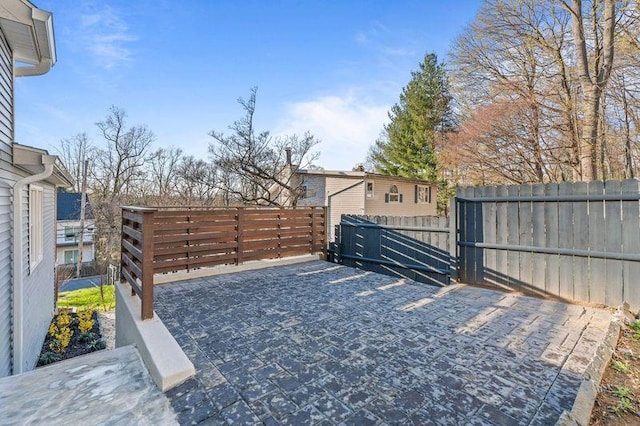 view of yard featuring a gate and fence