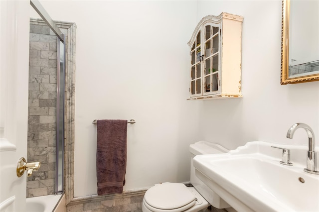 bathroom with sink and toilet