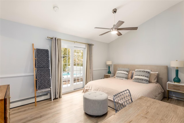 bedroom with light hardwood / wood-style flooring, access to exterior, a baseboard radiator, and vaulted ceiling