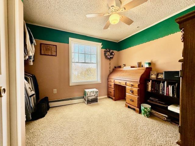 carpeted bedroom featuring a textured ceiling, a baseboard radiator, and ceiling fan