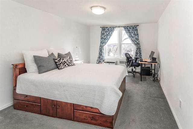 carpeted bedroom featuring baseboards