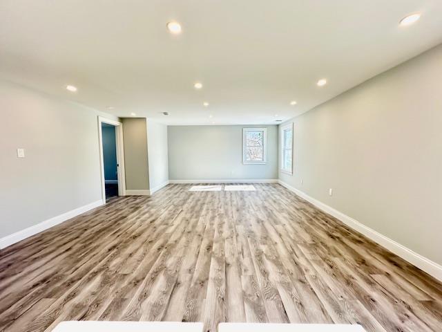 spare room featuring light wood-type flooring