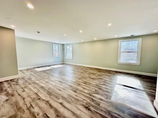 unfurnished room with light hardwood / wood-style flooring