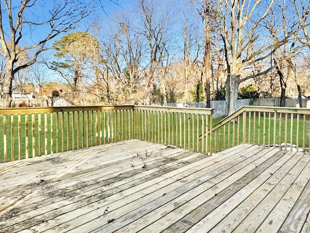 deck featuring a lawn