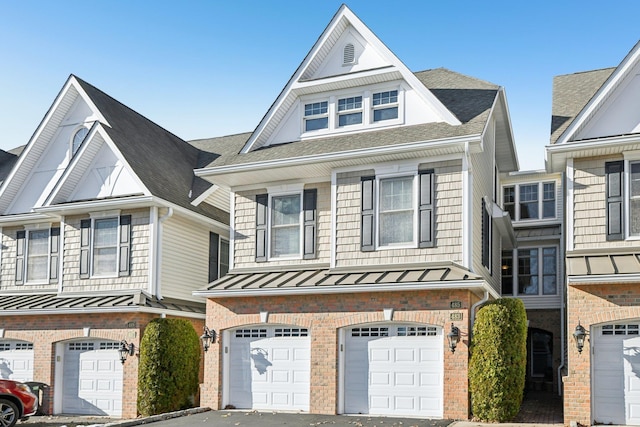 view of front of property featuring a garage