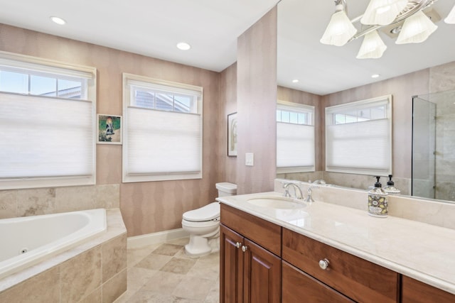 full bathroom featuring vanity, shower with separate bathtub, tile patterned floors, and toilet