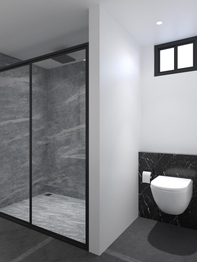 full bath featuring toilet and a walk in shower