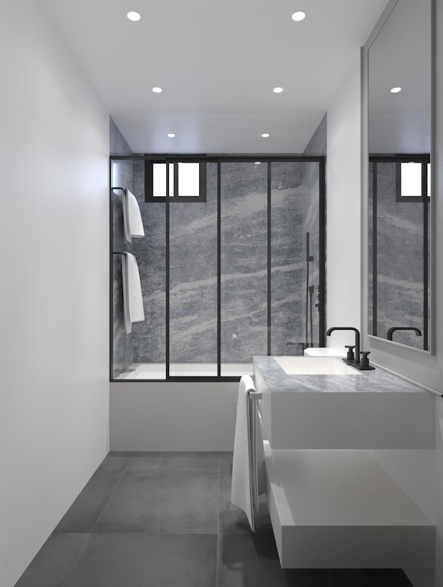 full bath featuring a shower with shower door, vanity, and recessed lighting