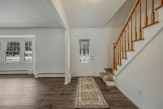 entryway with dark hardwood / wood-style flooring, plenty of natural light, and a baseboard radiator