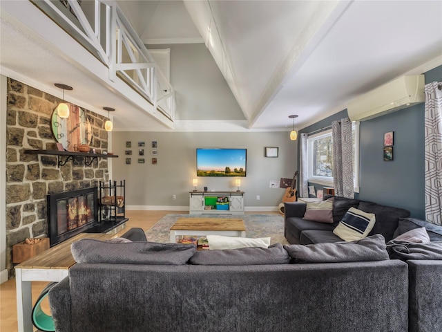 living room featuring high vaulted ceiling, a wall unit AC, a fireplace, ornamental molding, and light wood-type flooring