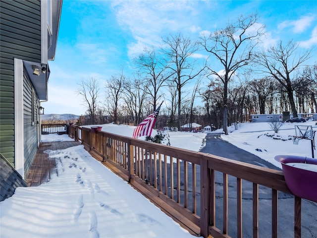 view of snow covered deck