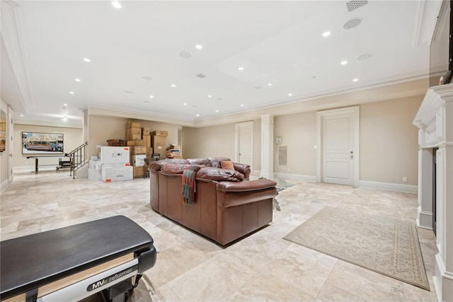 living room featuring crown molding