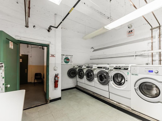 laundry area with separate washer and dryer